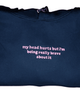 My Head Hurts Adult Hoodie, Premium Comfortable Unisex Pullover for Everyday Wear by Flossie & George at brixbailey.com