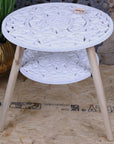 Elysian Bloom two-tier shabby chic side table, vintage white floral cut-out design, premium pine wood and MDF, stylish home decor accent by Maravi at brixbailey.com