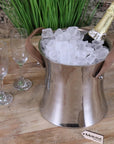 Luxury Navin champagne ice bucket, premium double wall aluminum, stylish silver finish, elegant leather handles, best-selling compact design by Maravi at brixbailey.com