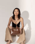 Luxury Alexia small hobo bag in smooth caramel leather, elegant and sophisticated, best-selling genuine leather handbag with silver hardware by Bob Oré at brixbailey.com