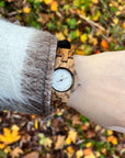 Premium handmade zebrawood watch for women, sustainable reclaimed wood, natural brown grain, minimalist bright dial by The Sustainable Watch Company at brixbailey.com