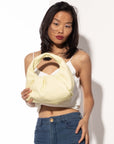 Bright yellow Marshmallow Croissant leather handbag by Brix Bailey at www.brixbailey.com