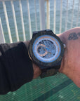 Premium handcrafted wooden watch for men, recycled ebony and sandalwood with exposed mechanical movement, eco-friendly luxury timepiece by The Sustainable Watch Company at brixbailey.com