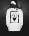 Luxury oversized white long sleeve with handprinted WWOOLLFF CO graphics, premium organic cotton, stylish unisex design by WWOOLLFF CO. at brixbailey.com