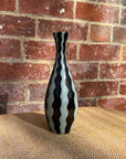 Black and white striped vase