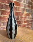Black and white striped vase