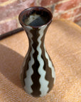 Black and white striped vase