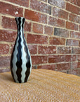 Black and white striped vase