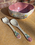Floral salad bowl, with serving utensils