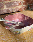 Floral salad bowl, with serving utensils