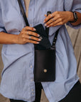 Eco-Friendly Leather Phone Bag with Strap & Closure