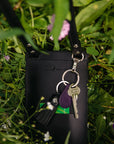 Eco-Friendly Leather Phone Bag with Strap & Closure