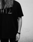 Limited edition black organic cotton tee, handprinted in Helsinki, premium unisex extra large fit, luxury sustainable design by WWOOLLFF CO. at brixbailey.com