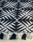Luxury monochrome flat weave rug, handmade in India, pure wool geometric design with tassels, 170x240cm, best-selling contemporary style by Maria Starling Design at brixbailey.com