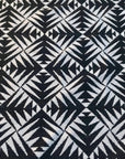 Luxury monochrome flat weave rug, handmade in India, premium pure wool, stylish geometric design, large edge tassels, best-selling contemporary ethnic decor by Maria Starling Design at brixbailey.com