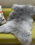 Luxury British sheepskin rug in slate grey, premium handcrafted sheepskin throw, soft hygge Nordic decor by Wildash London at brixbailey.com