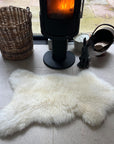 Luxury British white sheepskin rug, large eco-tanned sustainable premium throw, best-selling velvety cream fleece by Wildash London at brixbailey.com