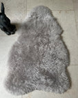 Premium Icelandic sheepskin throw in dove grey, large luxury sheepskin rug, best-selling shorn sheepskin, handcrafted and sustainable by Wildash London at brixbailey.com
