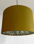 Mustard velvet wonderland drum lampshade, double sided lampshade with sage wonderland paper on interior