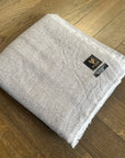 Luxury Noble Cashmere Blanket, premium handwoven 100% cashmere wool, XL super soft grey-brown herringbone throw, 125 x 250 cm, elegant and stylish by Wildash London at brixbailey.com