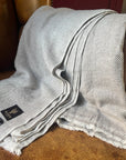 Premium Noble Cashmere Blanket, luxury handwoven grey-brown herringbone throw, 100% Nepalese cashmere, 125x250 cm, soft and warm by Wildash London at brixbailey.com