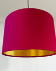 Cerise pink velvet drum lampshade/ ceiling shade with a metallic brushed gold lining