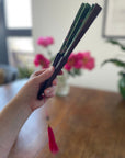 Green hand-held silk fan with 'Greenery' mushroom and crystal botanical artwork