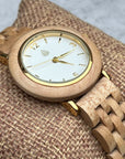 Luxury upcycled maple wood watch for women, handcrafted recycled wood, white dial, gold accents, natural birch wood, classic stylish design by The Sustainable Watch Company at brixbailey.com