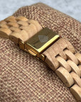 Luxury upcycled wood watch for women, handcrafted from recycled maple wood, white face with gold accents, natural birch wood by The Sustainable Watch Company at brixbailey.com