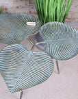 Luxury Ramai Three Leaf Side Table, stylish green and gold boho accent table, nature-inspired metal tripod decor by Maravi at brixbailey.com