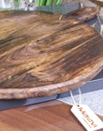 Amba premium round wooden serving board, luxury mango wood charcuterie board, stylish rustic kitchen serving tray by Maravi at brixbailey.com