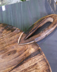 Premium Amba round wooden serving board, luxury mango wood with rustic handle, stylish charcuterie cheese tray by Maravi at brixbailey.com