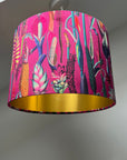 Cerise pink botanical velvet drum lampshade / ceiling shade, with a metallic brushed gold lining