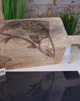 Luxury wooden fish serving platter board, handcrafted mango wood with engraved lobster or fish design, stylish coastal kitchenware by Maravi at brixbailey.com