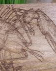 Luxury handcrafted wooden fish serving platter board with intricate lobster or fish engraving, premium mango wood, coastal kitchenware by Maravi at brixbailey.com