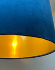 Navy velvet drum lampshade/ ceiling shade with a metallic brushed gold lining