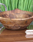 Luxury large wooden fruit bowl, handcrafted mango wood with unique three-point design, stylish kitchen decor, best-selling rustic serving bowl by Maravi at brixbailey.com