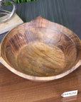 Lailak large wooden fruit bowl, premium mango wood with natural grain, stylish three-point design, rustic kitchen decor, best-selling serving bowl by Maravi at brixbailey.com