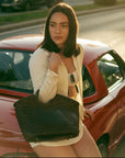 CELIA Calfskin Leather Tote from SOOK - Spacious Travel Bag with Cotton Drawstring Organizer | Handmade in Italy by Sook Stainable at brixbailey.com
