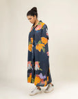 Luxury oversized long pleated dress with belt tie-up, printed multicolor, upcycled cotton-linen blend, best-selling JOAN dress by Bethikal at brixbailey.com