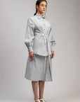 Luxury oversized ice blue upcycled cotton linen shirt with tie-up detailing, stylish and comfortable, best-selling premium fashion by Bethikal at brixbailey.com