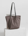 Brown Denim Tote Bag with Leather Handles – Stylish & Durable by Muni at www.brixbailey.com