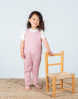 Soft Pink Organic Cotton Dungarees with Floral Appliqué, Horn-Button Fastening, and Kangaroo Pocket by Flossie & George at brixbailey.com