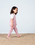 Premium Organic Cotton Pink Dungarees with Floral Appliqué and Horn-Button Fastening - Sustainable Kids Clothing by Flossie & George at brixbailey.com
