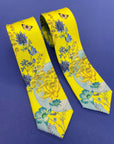 Vibrant yellow and pale blue ‘Luciferin’ floral silk tie