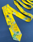 Vibrant yellow and pale blue ‘Luciferin’ floral silk tie