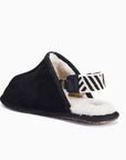 Luxury mens sheepskin slippers, slingback design with detachable strap, premium double-faced shearling, lightweight EVA sole, black and white by MANTIDY at brixbailey.com