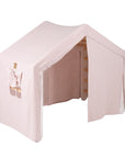 Large White Ladder House With a Pink Cover
