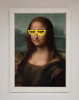 Luxury Mona Lisa Glasses Framed Print, stylish modern twist on classic artwork, premium home decor, trending best-selling wall art by Zestio at brixbailey.com
