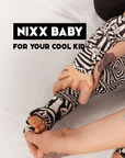 High Contrast Print Bamboo Zip Onesie - Soft, Stretchy & Fun for Baby's Development & Fashion by NIXX BABY at brixbailey.com